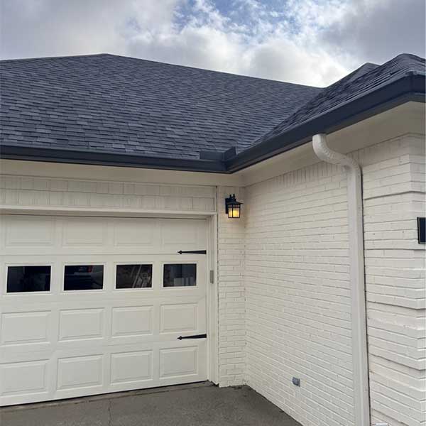 Home with Dark Bronze Gutters